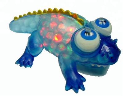 China Flashing moving eyes light up alligator toy for sale