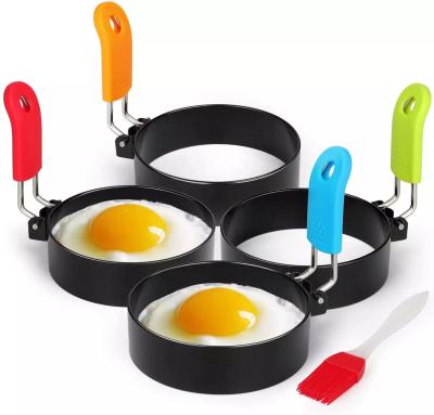 China Amazon Viable Hot Sale 2pc 4pcs Fried Egg Omelette Mold Handle Non-Stick Egg Rings Set with Silicone Brush for sale