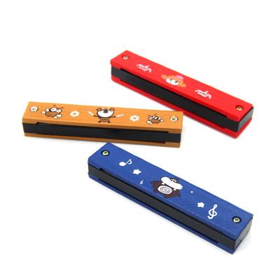 China 2019 Eco-friendly Various Types Music Harmonica 16 Holes High Quality Wooden Bee Harmonica Printing Wooden Toys For Children for sale