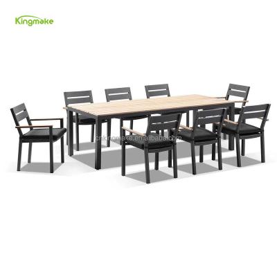 China Modern garden used white color 8 seater dining table and chairs outside teak wood aluminum top table furniture outdoor patio furniture for sale