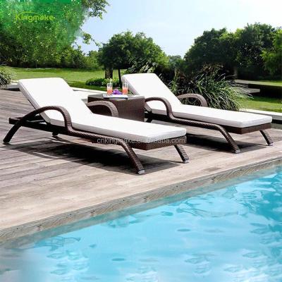 China Contemporary wholesale resin wicker outdoor furniture beach bed with armrest rattan sun UV resistant sofa for swimming pool for sale