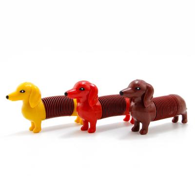 China Children's Toys High Quality Funny Plastic Animal Dog Toys Educational DIY Toys Pullable Spring Dog Toy For Children for sale