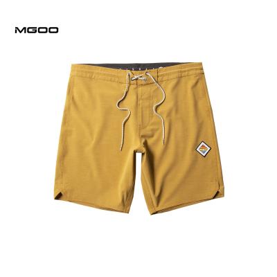 China MGOO Anti-UV OEM Printed 7 Inch Swim Trunks Quick Dry Reuse Mens Fabric Swimwear for sale