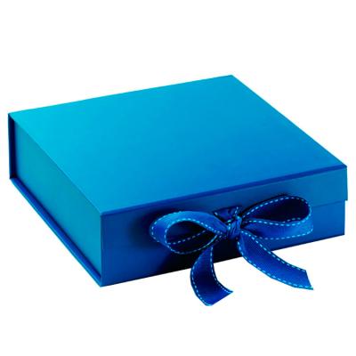 China Recycled Custom Blue Paper Gift Packaging Box Folding Materials Magnetic Flat Pack Foldable Box With Ribbon for sale