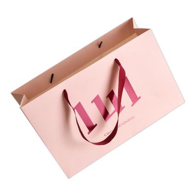 China Materials Factory Custom Low Cost Christmas Pink Luxury Wedding Recycled Paper Bag For Garment/Gift Packaging for sale