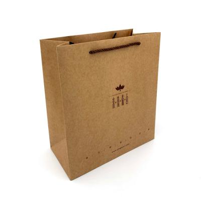 China Custom Recycled Materials Logo Luxury Cardboard Paper Gift Bag With Twisted Rope Handle Kraft Paper Bag Printing for sale