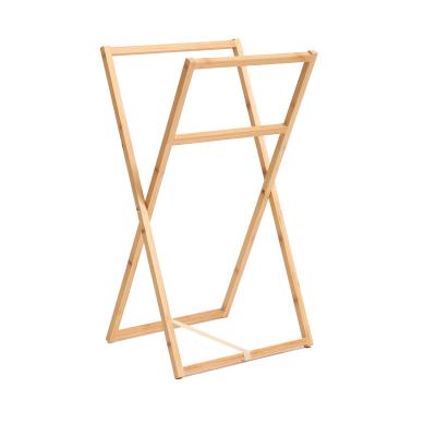 China Chinese simple design towels drying rack for bathroom bamboo X shape foldable towel 2 rods hanger for sale