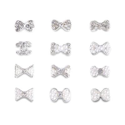 China 2022 12 Kinds Factory Price Design Pearl Bow Nail The New Art Alloy Jewelry Designer Nail Charm Nail Art Accessories for sale