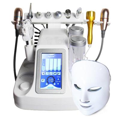 China Acne Treatment 12 In 1 Multifunctional Facial Vacuum Suction Tool Machine Skin Care Device for sale