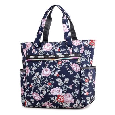 China Fashion Hot Selling Women Fashion Tote Bag Large Capacity Nylon Floral Printing Pattern Bag Shopping Handbag for sale