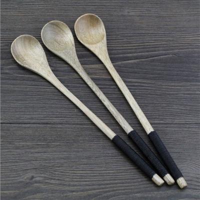 China Viable pure color handle creative non-slip spoon healthy wooden dinner soup spoon set for sale