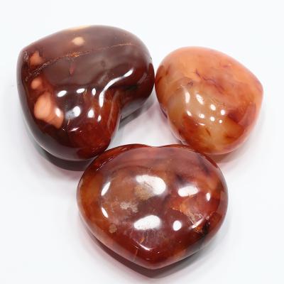 China Feng Shui Natural Fluorite Home Decoration Carnelian Crystal Heart Carved Wholesale Natural Agate Stone Red Love China Gift Hand Craft for sale