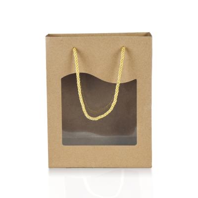 China Recyclable Cheap Kraft Paper Bag With Clear Window And Paper Handles Using For Packing Gifts Or Foods for sale