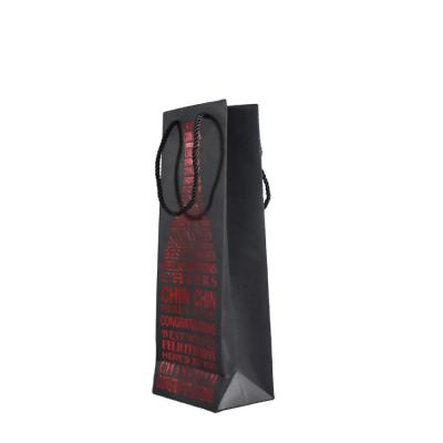 China Recycled Materials Store Red Hot Stamping On Black Plain Paper Bottle Bag For Packing Wine Or Other Gifts for sale