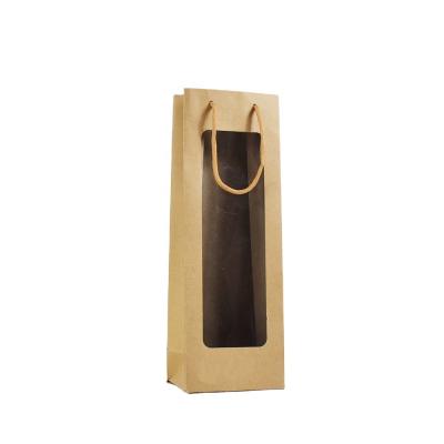 China Recyclable Stock Whole Sales Brown Kraft Paper Bottle Bag With Transparent PVC Window For Packing Wine for sale