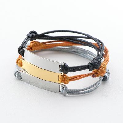 China Wholesale Personalized Punk 2022 Logo Stainless Steel Charm Woven Wax Rope Bracelet Adjustable For Women for sale