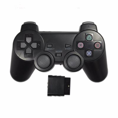 China Wireless gamedpad for ps2 gamepad color vibration control gaming protection 2.4G transparent wireless game controller for sale