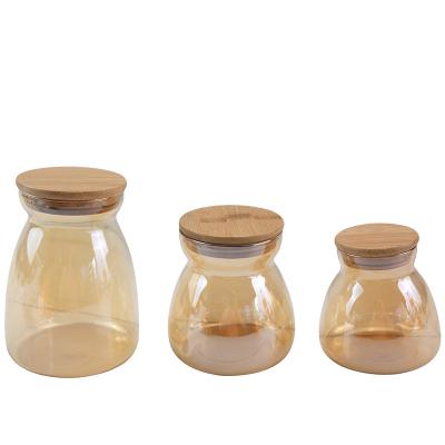 China High Sustainable Borosilicate Glass Bottled Storage Jar Flower Tea Sealed Jar With Bamboo Cover for sale