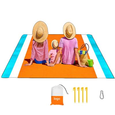 China Pocket Beach Blanket Picnic Blanket, Extra Large Waterproof Sandproof Water Resistant Beach Mat with 4 Fixed Nails, Reinforced Edging for sale