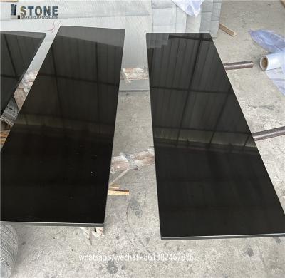 China Freestanding black tiles absolutely black granite tile for kitchen tops and floors with granite slabs for sale