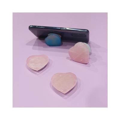 China Adjustable Natural Heart Shaped Rose Quartz Crystal Mobile Phone Holder for sale