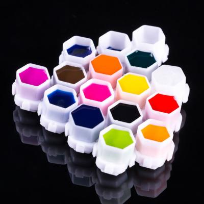 China 200PCS/Bag Honeycomb Structure Disposable Tattoo Pigment Container Tattoo Ink Disposable Plastic Cups For Tattoo Inks for sale