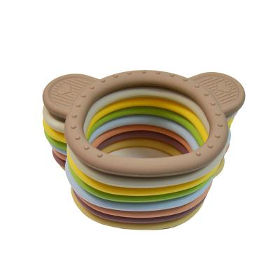 China Soft Toy Hot Sale Chewable BPA Free Teething Wristband Silicone Baby Bear Teether Toy for Soothing Teething Pain Relief for sale