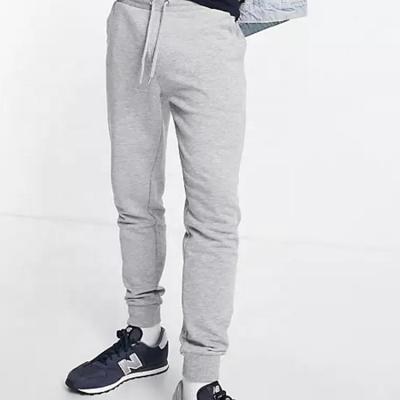 China Anti-Wrinkle OEM Design Custom Mens Tracksuits Slim Fit Bottoms Skinny Sport Tracksuit Mens Tracksuits for sale