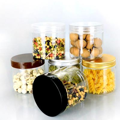 China Food Design Flat Round Clear Different Size Glass Sauce Storage Bottles Food Jar With Cover for sale