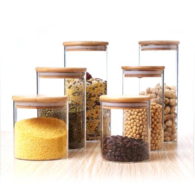 China Fancy Food Grade Fancy Keep Fresh Straight Round Borosilicate Glass Clear Jar Top With Bamboo Lid for sale