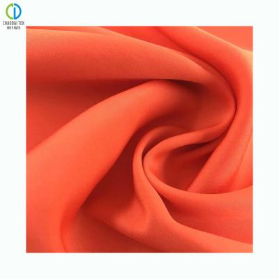 China Tear-Resistant Orange Silky French Velvet 100%Recycled Polyester Chiffon Fabric For Shirts Dress for sale