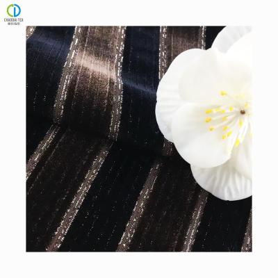 China Memory Dark Brown Spun Velvet Recycled Polyester Fleece Fabric Gold Foil For Bags for sale