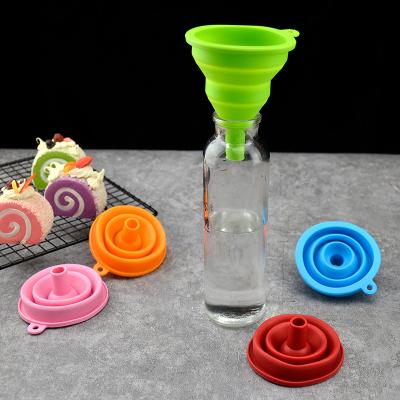 China 2022 Viable Multifunctional Kitchen Mini Silicone Funnel Folding Silicone Rubber Funnel for sale