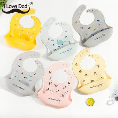 China Custom Food Grade Silicone BPA Free Silicone Soft Waterproof Baby Bib Colorful Baby Bib With Food Catcher for sale