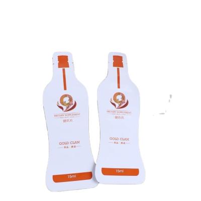 China Recycled Materials Heat Seal Special Bottle Shaped Pouch Mask Sachet Aluminum Foil Cosmetic Facial Packaging Bag for sale