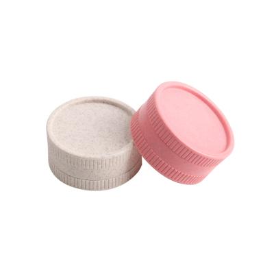 China Sharp Teeth Wholesale Grinder Plastic Biodegradable Herb Tobacco Grinder Accessories 54mm Grinders for sale