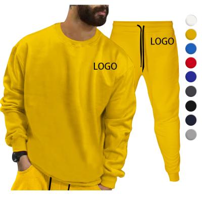 China Amazon New Design QUICK DRY Solid Color Long Sleeves Sports Sets Drawstring Unisex Pants Leisure Workout Pants Sets Men Sweatshirt Set for sale