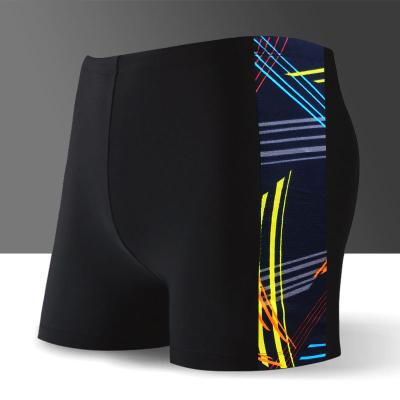 China QUICK DRY Multicolor Elastic Plus Size Men's Swimming Shorts Sides Printing Loose Swimming Shorts Men for sale