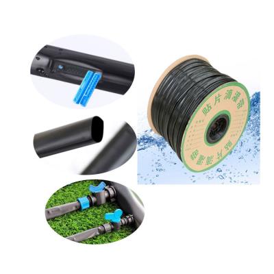 China Water Saving Drip Irrigation Working Hot Selling Emitter Irrigation Flat Strip For Sweet Potato Planting Under Film for sale