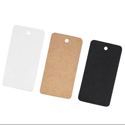 China Recyled Custom Free Design Printing Name Logo Brand Tags Kraft Paper Tags Clothing Hang Tags With White Black String for sale