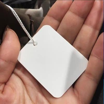 China Recyled Custom Free Design Printing Name Logo Brand Tags Kraft Paper Tags Clothing Hang Tags With White Black String for sale