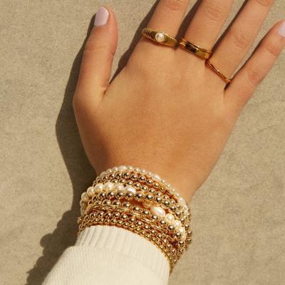 China CLASSIC 3mm 4mm 5mm 6mm 8mm 10mm Gold Bead Bracelet Acrylic Plastic Ball Beaded Bracelet With Elastic Line for sale