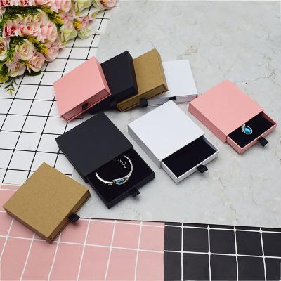 China Custom Jewelry Box Wholesale Custom Eco Friendly Logo Printed Small Size Earring Bracelet Necklace Ring Packaging Paper Jewelry Storage Box for sale