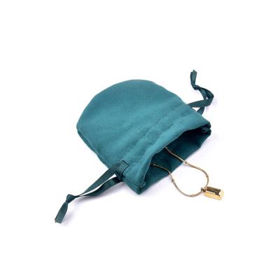 China OEM+ODM+Wholesale Eco-Friendly Natural Colored Microfiber Cloth Custom Made Round Suede Cord Packaging Necklace Jewelry Pouches for sale