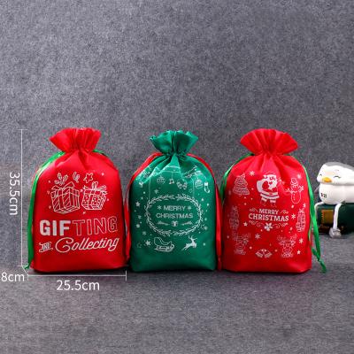 China Non Woven Drawstring Gift Pouch Christmas Candy Bag Non Woven Promotional Drawstring Bag for sale