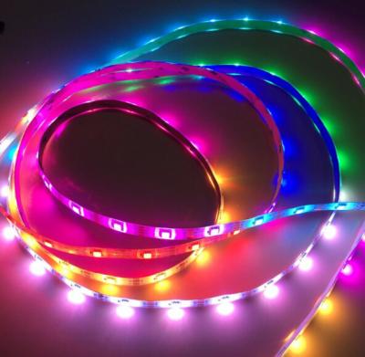 China Addressable 5m 30LEDs/m DC5V WS2813 RGB led pixel strip,waterproof by silicon coating;IP65,with 30pixels/M;WHITE PCB for sale