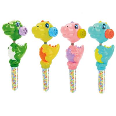 China Cartoon Toys Funny Plastic Dinosaur Cosby Candy Toys With Sugar Tube Shaking Whistle Toy For Wholesale for sale