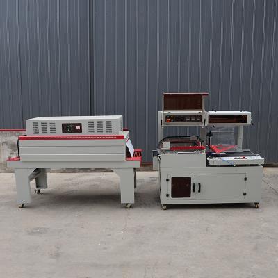 China Compact L Shape Shrink Wrap Packaging Machine Voltage 380V 440V for sale