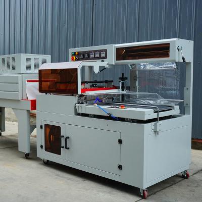 China Effortless L Sealing Packaging With PLC Controlled Automated Shrink Wrapping System for sale