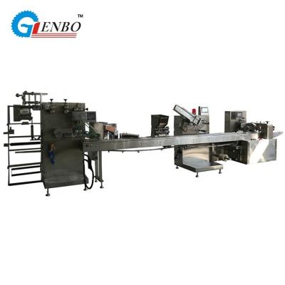 China Automatic Wet Products Tissue Napkin Fork Spoon Cutlery Packing Machine Manufacturer for sale